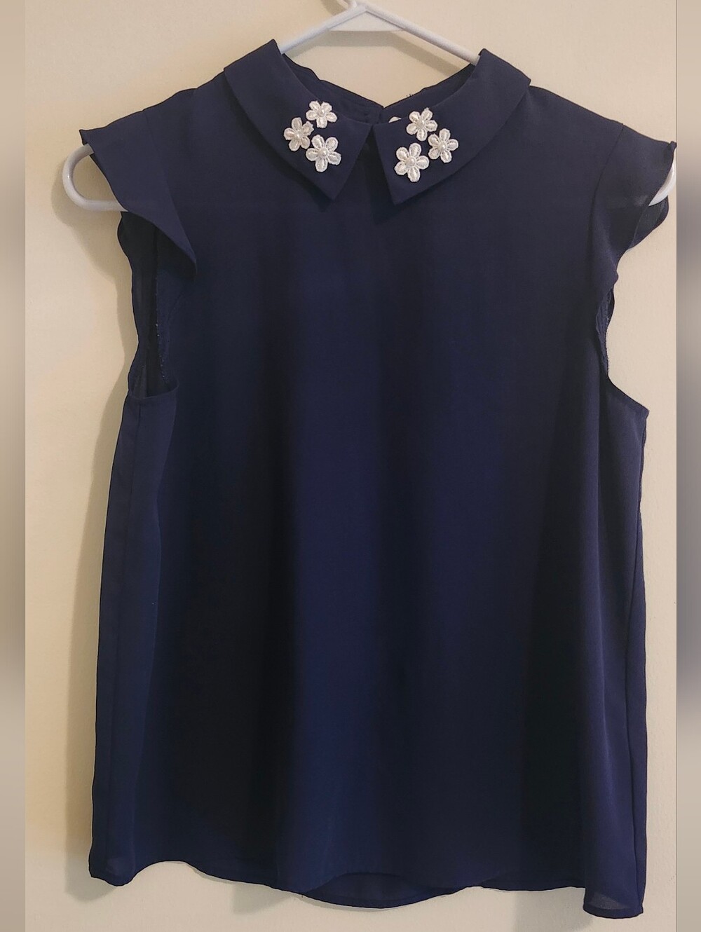 Elle Navy Sleeveless Blouse with Embellished Peter Pan Collar